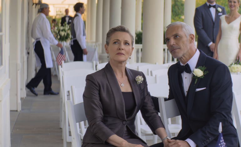 “At my son’s luxury wedding, they put me in row 14 right beside the service area. The bride leaned in and whispered, ‘Please… don’t make us look bad today.’ Then a man in a black suit sat next to me and murmured, ‘Let’s pretend we came together.’ When my son looked down and saw us, his face went pale.”—and the cruel part wasn’t the seat… it was how calmly they expected me to accept it.